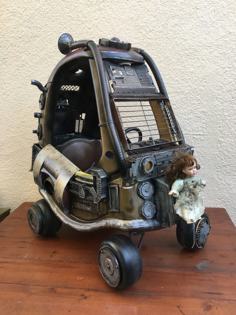 No Death Car is complete without an affixed creepy doll.