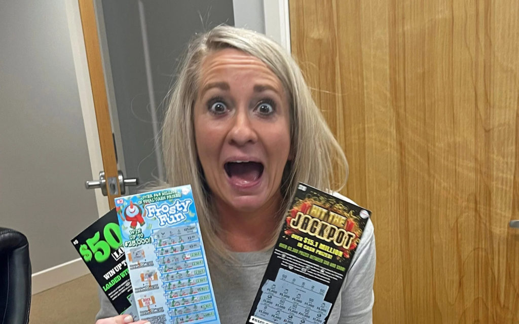 Woman Gets Jackpot Lottery Ticket at White Elephant Gift Exchange