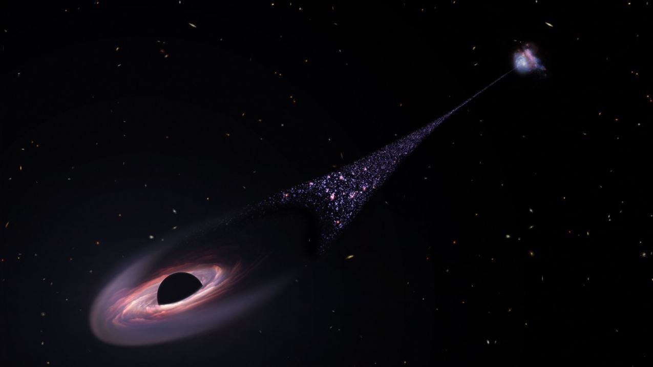 Watch Supermassive Black Hole Followed By Infant Stars