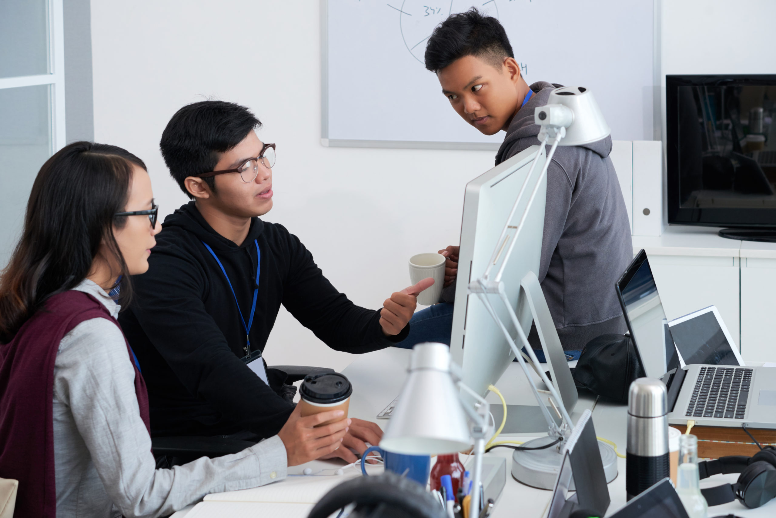 Business professionals discussing AI strategy in a meeting