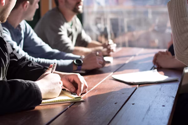 Eliminating Admin Friction with Automated Policy Reminders a group of people sitting